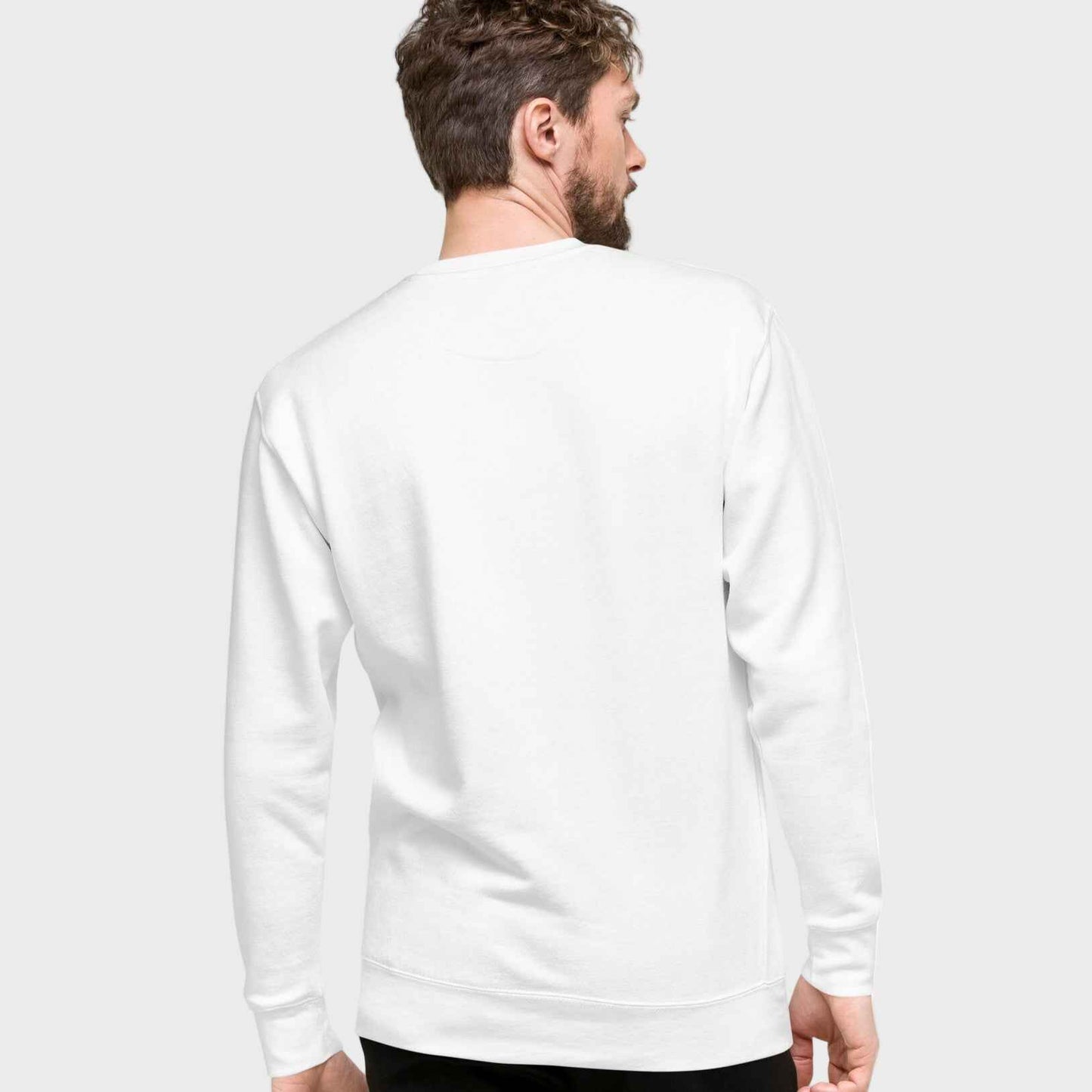 Man wearing white Christian long-sleeve shirt from behind