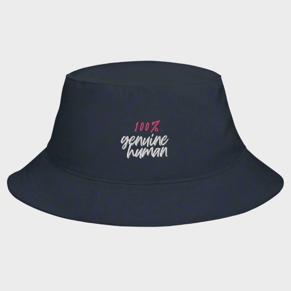 A black bucket hat with the text '100% genuine human' printed on the front.