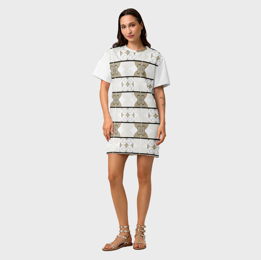 Woman wearing a patterned dress on a plain background