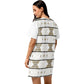 Woman wearing a patterned dress on a white background