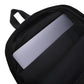 Black interior of a backpack with laptop inside