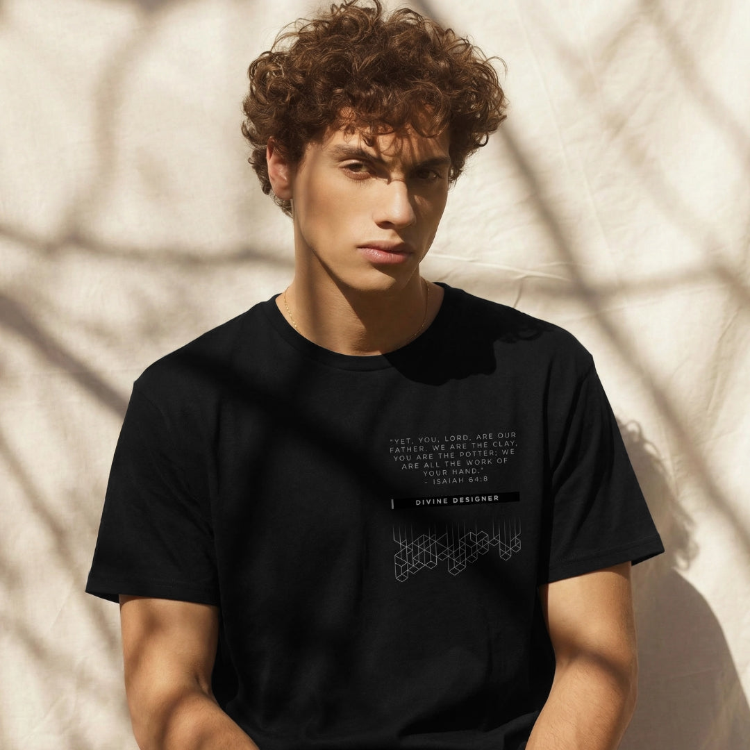 Person wearing a black t-shirt with text and graphics against a neutral background