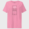 Pink t-shirt with empathy graphic and text on a light gray background