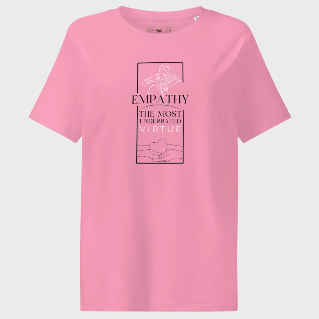 Pink t-shirt with empathy graphic and text on a light gray background