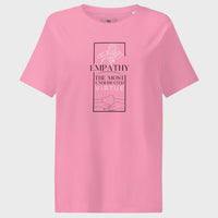Pink t-shirt with empathy graphic and text on a light gray background