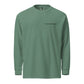 Green long-sleeve shirt with a brand logo on a white background