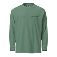 Green long-sleeve shirt with a brand logo on a white background