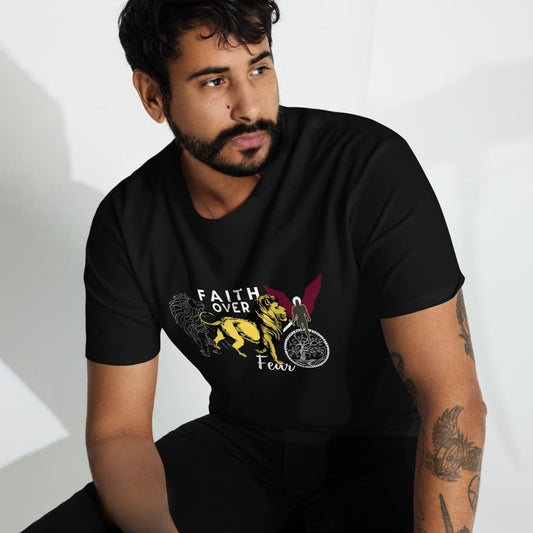 Man wearing a black t-shirt with a graphic design and text.