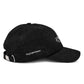Black cap with chain detail on a white background