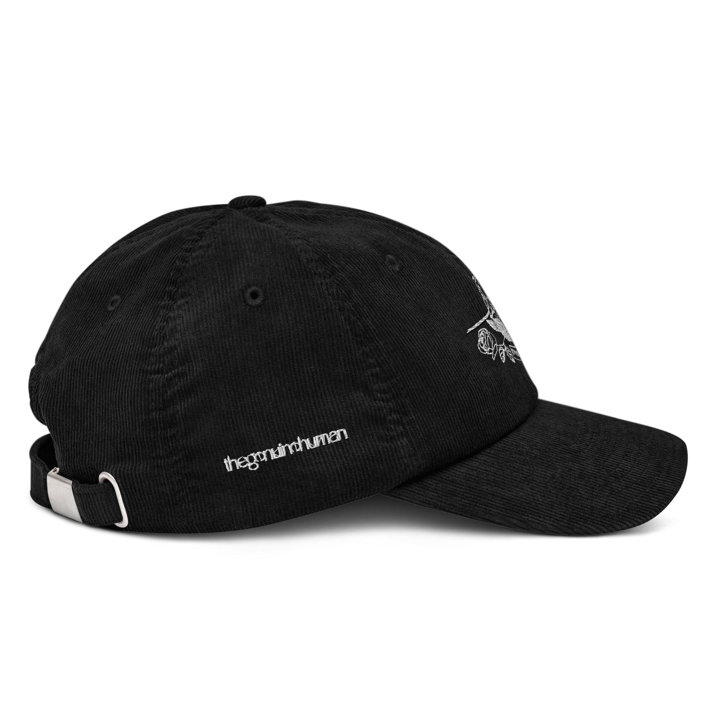 Black cap with chain detail on a white background