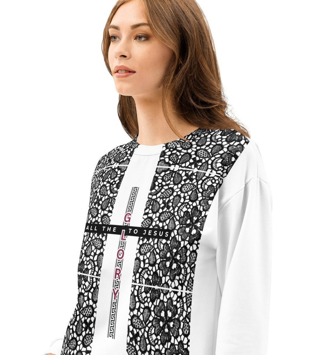 Woman wearing a black and white patterned top with text on a white background