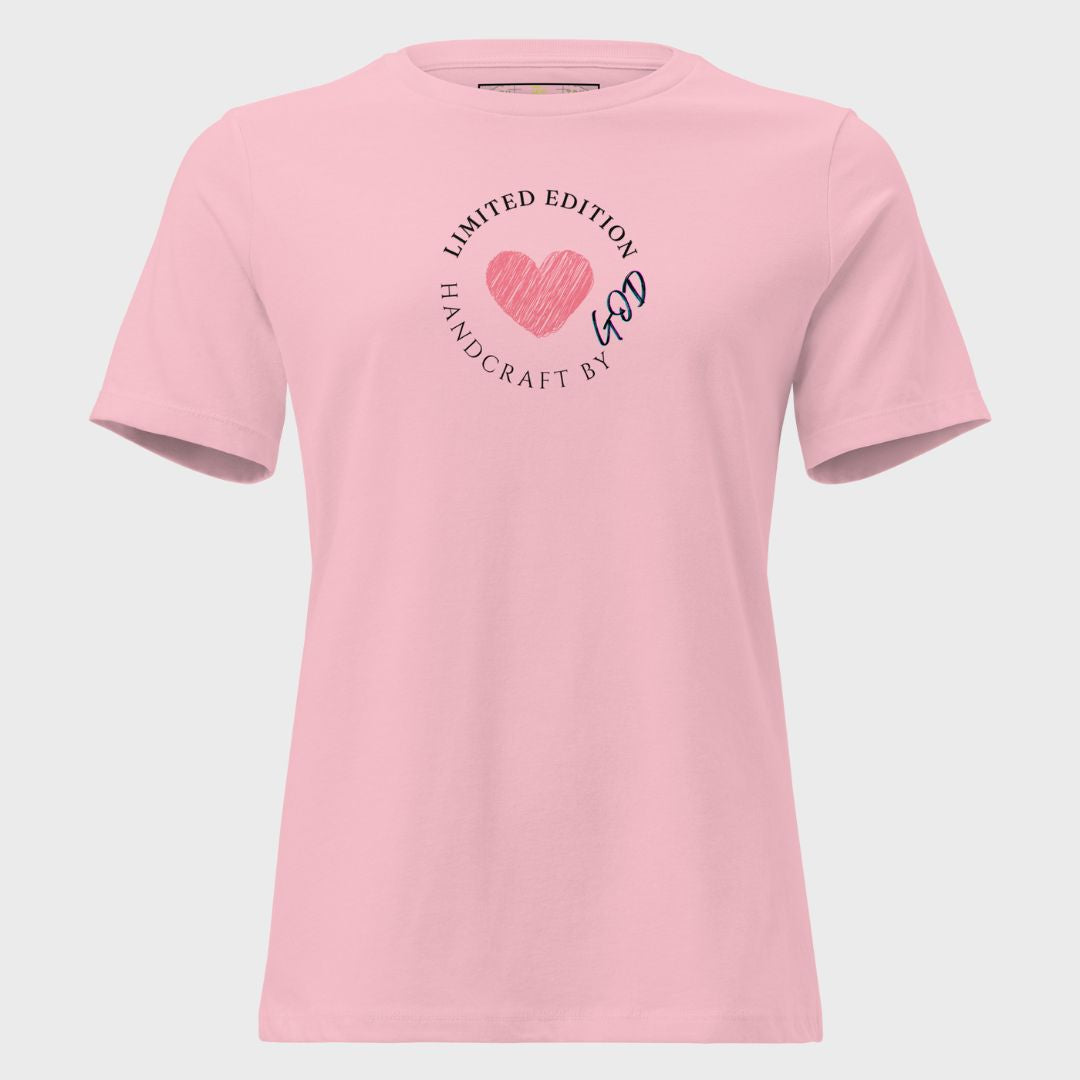 Pink t-shirt with text and heart design on a light gray background