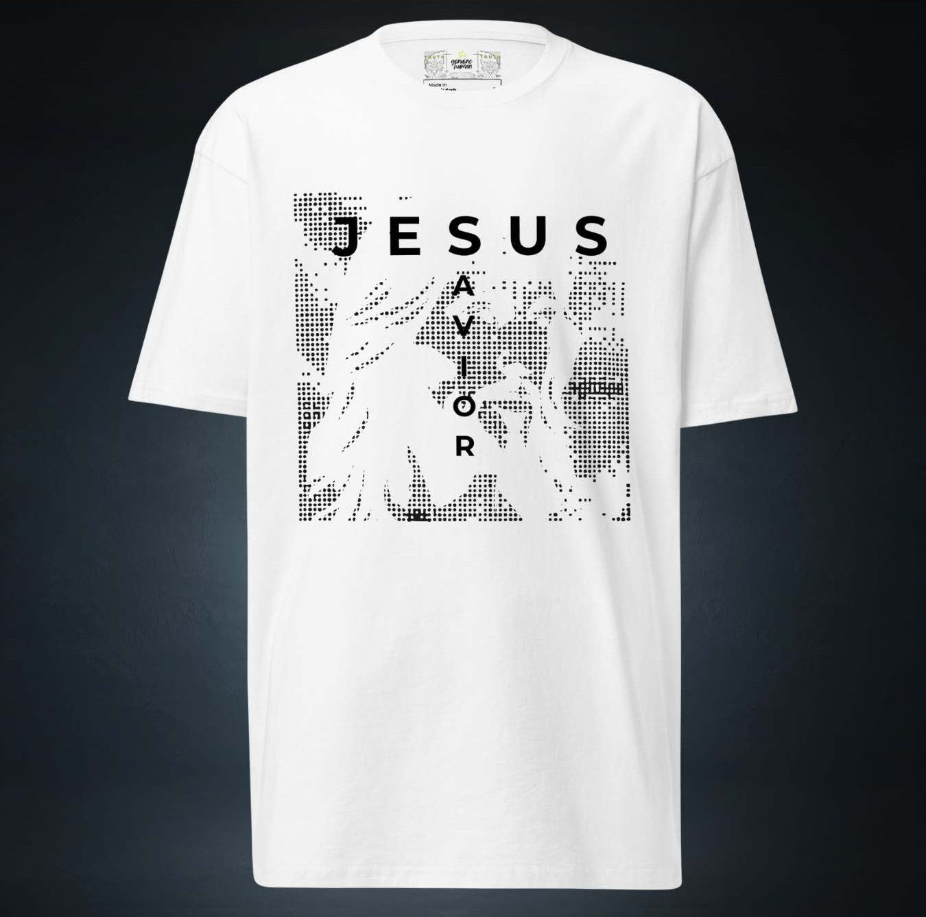 White t-shirt with 'JESUS SAVIOR' graphic design on a dark background