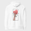 White hoodie with a pink heart and text design on a white background