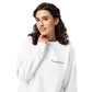 Woman wearing a white sweatshirt with a logo on a white background