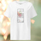 White t-shirt with a graphic design and text on a blurred background