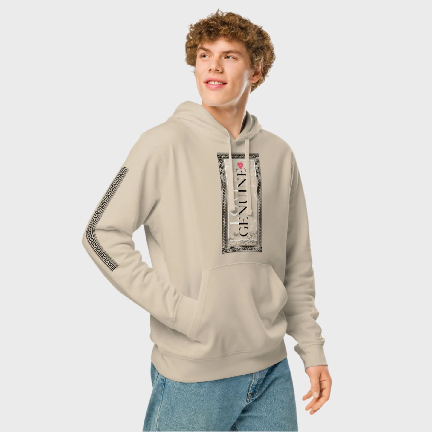 Person wearing a beige hoodie with a logo on a light gray background