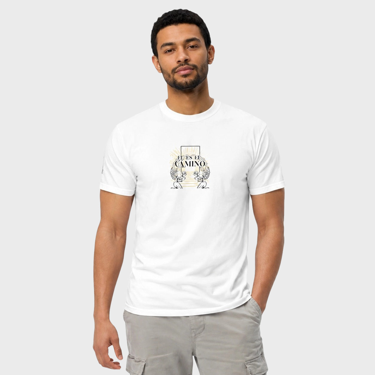 Man wearing a white t-shirt with a logo on a plain background