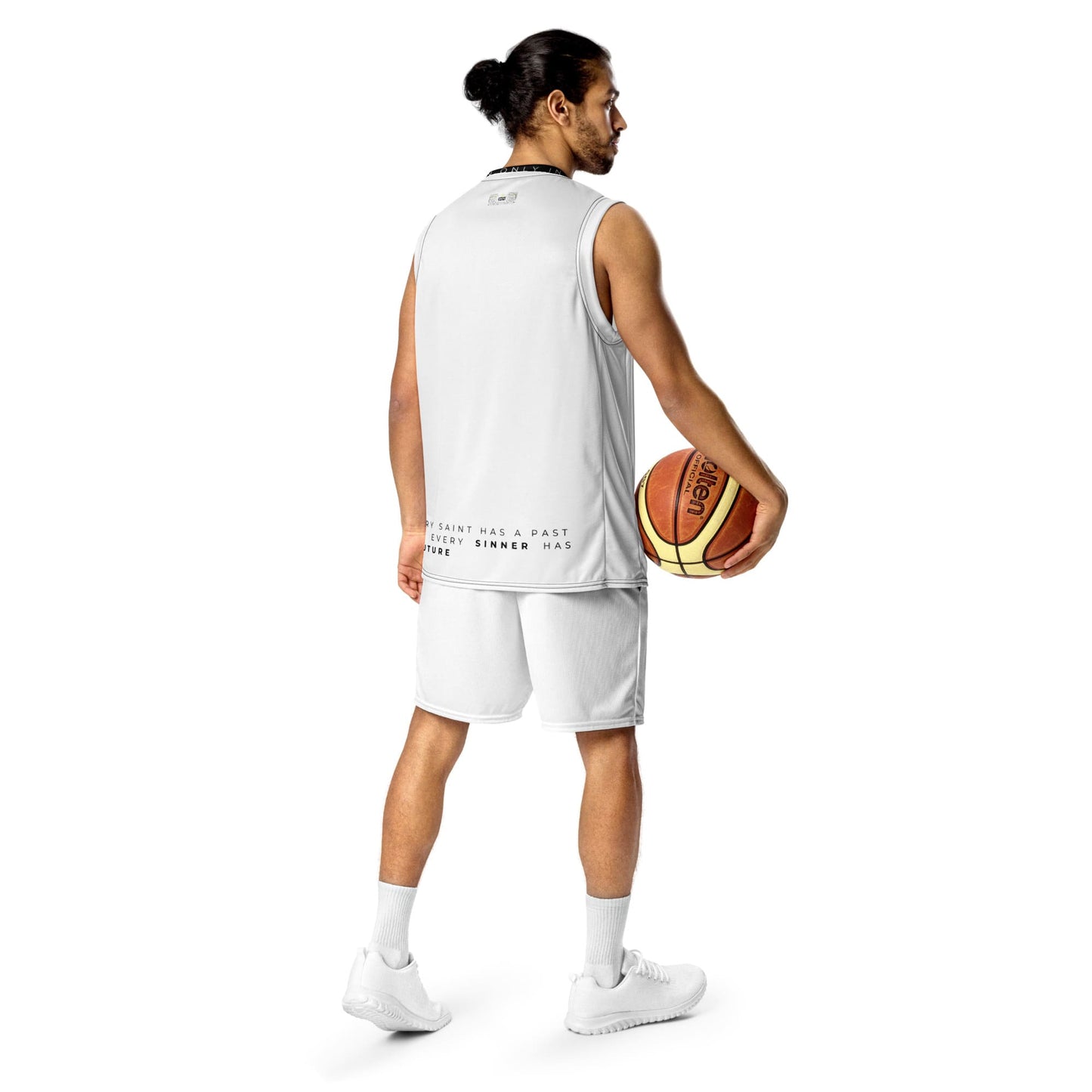 Man wearing Sports Tank with text at the bottom and holding a basketball visible from behind
