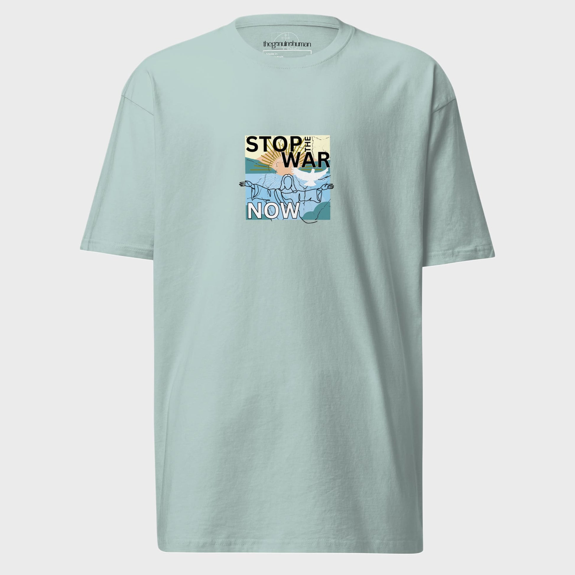 Light blue t-shirt with a graphic design and text on a light gray background