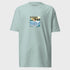 Light blue t-shirt with a graphic design and text on a light gray background
