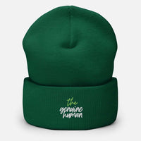 Pine green beanie hat with text thegenuinehuman 